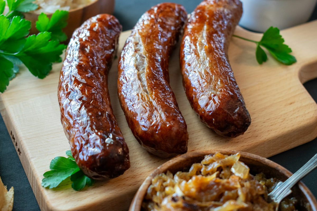 Andouille sausages on a wooden board