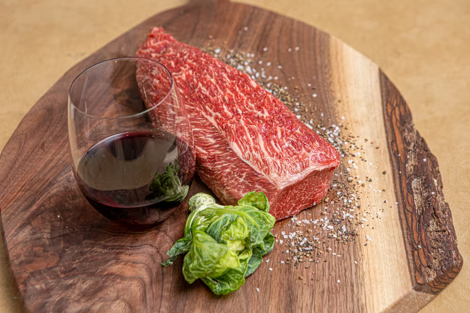 Raw Holy Wagyu beef cut on butcher paper