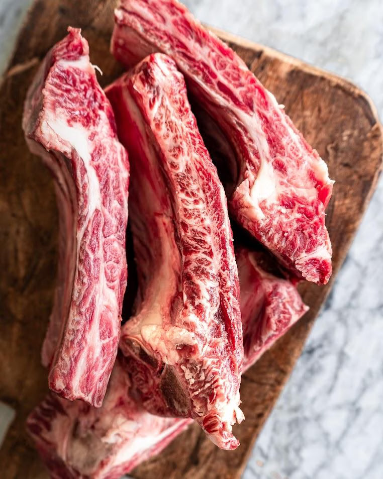 Holy Wagyu ribs prepared on a cutting board