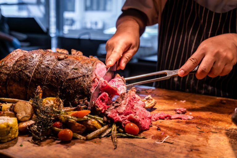 man cooking a meal out of wagyu beef