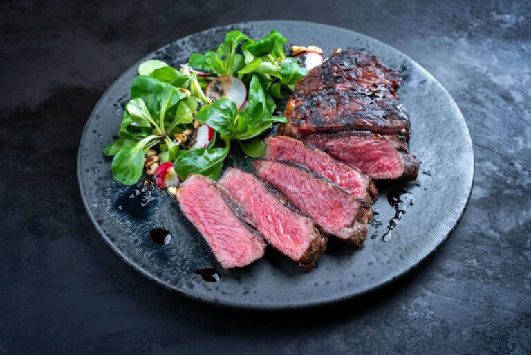 wagyu beef next to healthy vegetables
