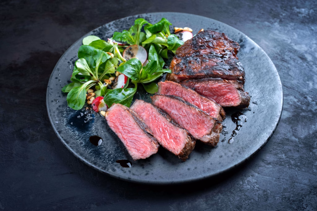 wagyu beef next to healthy vegetables