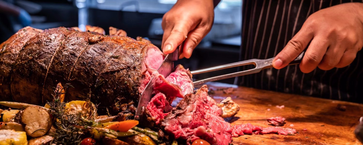 man cooking a meal out of wagyu beef