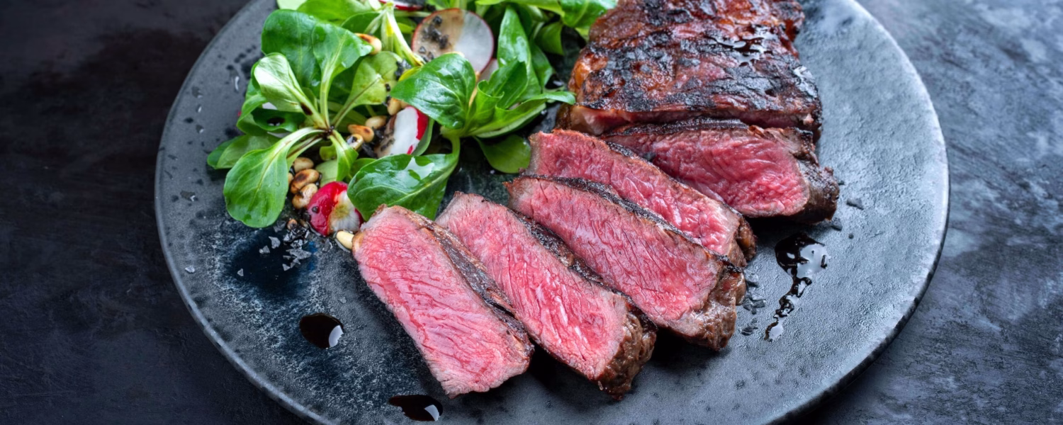 wagyu beef next to healthy vegetables